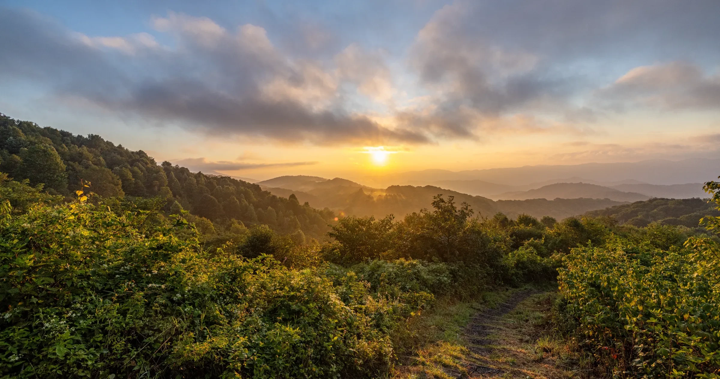 Sun rising over Max Patch and beautiful mountain scenery.