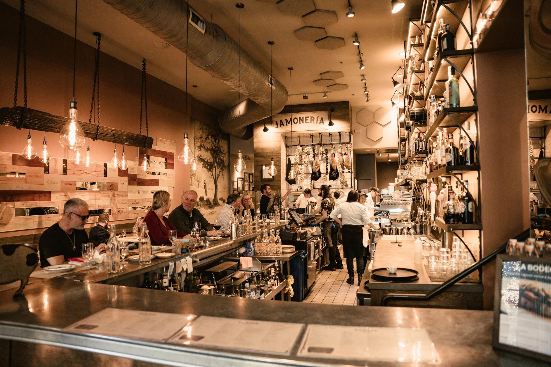 The cozy and elevated interior of the MICHELIN Guide recommended Cúrate Bar de Tapas in Asheville, North Carolina