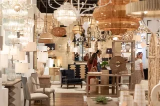 Layers of trendy home furnishings adorn the trade halls of the High Point Furniture Market.