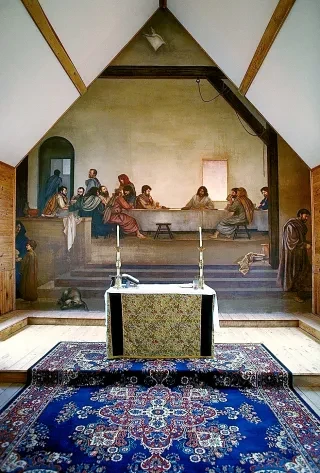 Ben Long fresco depicting the Last Supper at Holy Trinity Church behind altar.
