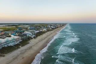 Aerial of Surf City shoreline, beaches and vacation rentals.