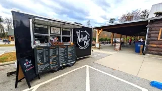 The Velvet Cup coffee truck outside of outdoor gear rental shop.