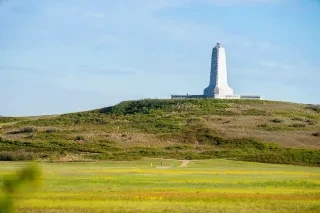 Wright Brothers Memorial on top of hill at national memorial site in Kitty Hawk.