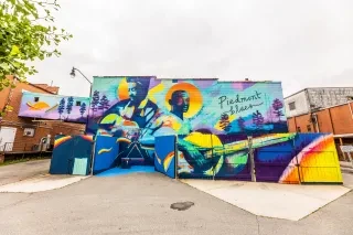 Front view of the Piedmont Blues mural in downtown Sanford.