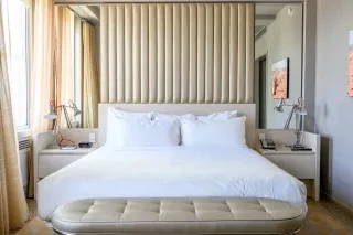 View of a modern bedroom layout of 21c Museum Hotel in Durham