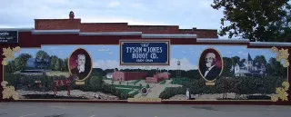 Tyson & Jones Buggy Co. mural on side of building in Carthage.
