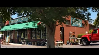 Exterior of Seagrove Pottery store with pottery outside shop.